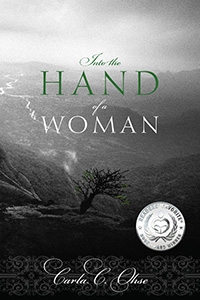 Award-winning, self-published book “Into the Hand of a Woman” written by Carla C. Ohse, published by Outskirts Press.